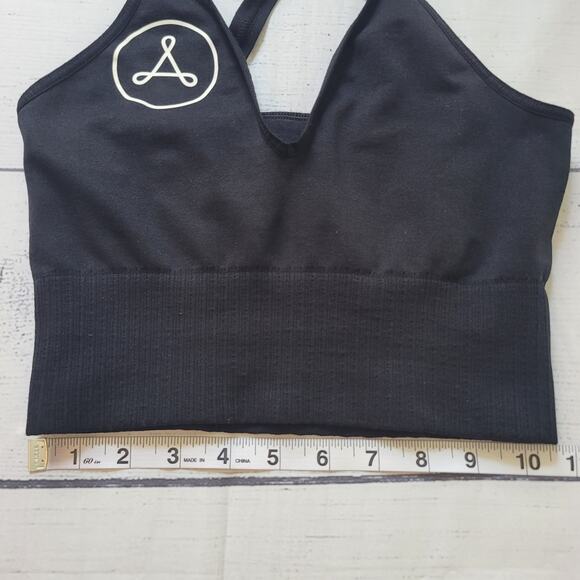 Free People Movement Size XS Good Karma Crop Tank Black Cross Back Symbol Front - Picture 6 of 6